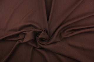 This multi purpose mock linen in chocolate brown would be great for home decor, window treatments, pillows, duvet covers, tote bags and more.  We offer this fabric in other colors.