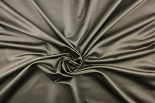 This multi-purpose mock linen in earth (gray and brown tones) has a soft luxurious feel with a subtle sheen.  It would be great for home decor, window treatments, pillows, duvet covers, tote bags and more.  We offer Shauna in other colors.