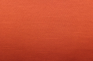 This multi-purpose mock linen in calypso (deep orange) has a soft luxurious feel with a subtle sheen.  It would be great for home decor, window treatments, pillows, duvet covers, tote bags and more.  We offer Shauna in other colors.