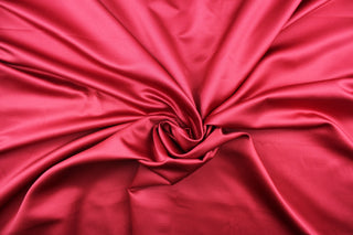 This multi-purpose mock linen in raspberry has a soft luxurious feel with a subtle sheen.  It would be great for home decor, window treatments, pillows, duvet covers, tote bags and more.  We offer Shauna in other colors.