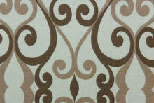 Load image into Gallery viewer, This indoor/outdoor fabric features a scroll design in taupe, and brown against a gray blue. 
