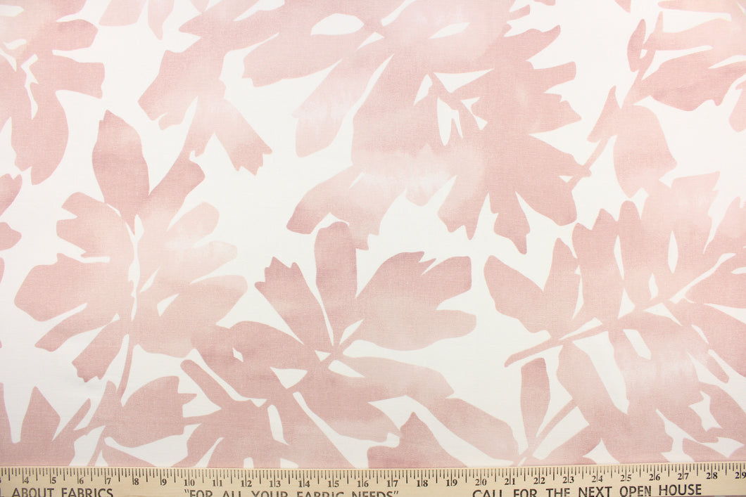 This fabric features a floral design in a pale pink against a white background. 
