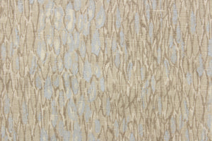 This fabric features an abstract design in brown gray tones and silvery blue colors.