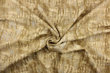 Load image into Gallery viewer, This fabric features an abstract design in brown tones, tan, and light beige with hints of sliver.
