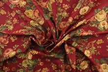 Load image into Gallery viewer, This fabric features a floral design in rose pink, burgundy, green, golden tan, beige, and hunter green against a deep red. 
