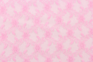 This lace features a woven floral design in a pink .