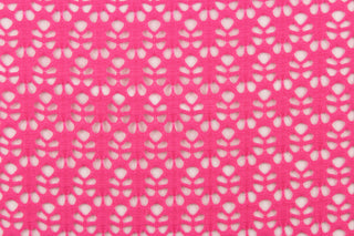 This lace features a unique design in a rich pink. 
