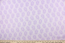 Load image into Gallery viewer,  This lace features a small woven floral design in a purple .
