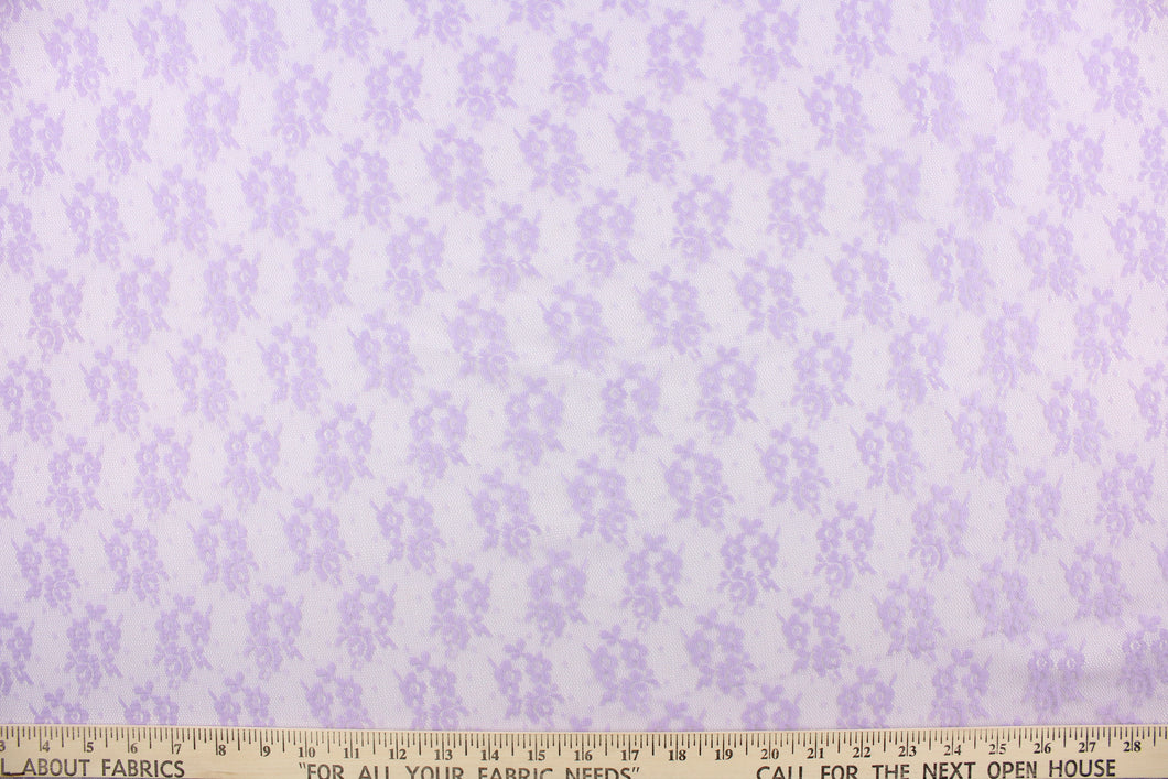 This lace features a small woven floral design in a purple .