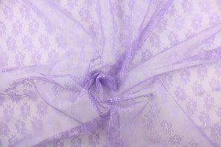  This lace features a small woven floral design in a purple .