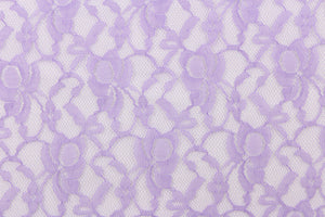 This lace features a woven floral design in  purple  .