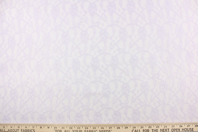 This lace features a woven floral design in a light purple.