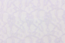 Load image into Gallery viewer, This lace features a woven floral design in a light purple.
