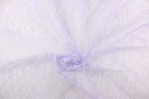 This lace features a woven floral design in a light purple.