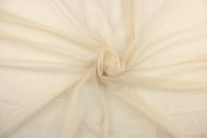 This tulle features a shimming design in a rich gold tone.