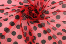 Load image into Gallery viewer,  A sheer, semi firm, tulle in red with black dots.

