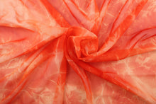 Load image into Gallery viewer, This sheer fabric features a tie dye design in orange.
