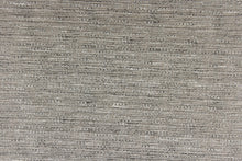 Load image into Gallery viewer, This multi-purpose mock linen in pewter has a soft feel with a subtle sheen.  It would be great for home decor, window treatments, pillows, duvet covers, tote bags and more.  We offer Seafarer in other colors.
