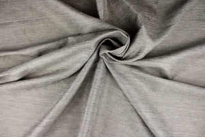 This multi-purpose mock linen in pewter has a soft feel with a subtle sheen.  It would be great for home decor, window treatments, pillows, duvet covers, tote bags and more.  We offer Seafarer in other colors.
