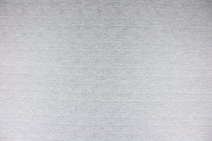 This multi-purpose mock linen in fog includes varying shades of light gray.  It has a soft feel with a subtle sheen.  It would be great for home decor, window treatments, pillows, duvet covers, tote bags and more.  We offer Seafarer in other colors.