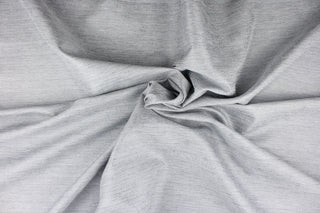 This multi-purpose mock linen in fog includes varying shades of light gray.  It has a soft feel with a subtle sheen.  It would be great for home decor, window treatments, pillows, duvet covers, tote bags and more.  We offer Seafarer in other colors.