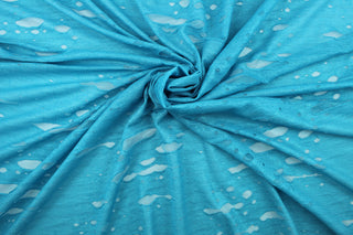 This stretch lycra blend fabric in iridescent sea blue. 