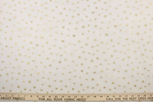  A sheer, semi firm, tulle featuring sparkly gold stars set against white. 