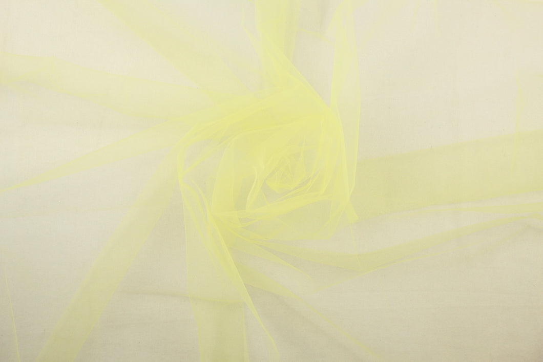 A sheer, semi firm, tulle in bright yellow .