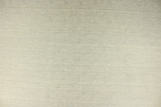 This multi-purpose mock linen in arctic includes the colors of beige and blue/green.  It has a soft luxurious feel with a subtle sheen.  It would be great for home decor, window treatments, pillows, duvet covers, tote bags and more.  We offer Seafarer in other colors.