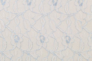 This lace features a woven floral design in baby blue and white .