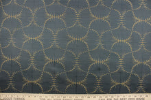Load image into Gallery viewer, This jacquard fabric features a whimsical print in dark beige on a slate background.  It is great for home decor such as multi-purpose upholstery, window treatments, pillows, duvet covers, tote bags and more.  It has a soft workable feel yet is stable and durable with a rating of 15,000 double rubs. 
