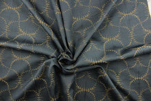 Load image into Gallery viewer, This jacquard fabric features a whimsical print in dark beige on a slate background.  It is great for home decor such as multi-purpose upholstery, window treatments, pillows, duvet covers, tote bags and more.  It has a soft workable feel yet is stable and durable with a rating of 15,000 double rubs. 
