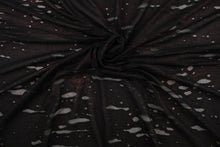 Load image into Gallery viewer, This stretch lycra blend fabric in black with undertones of red. 
