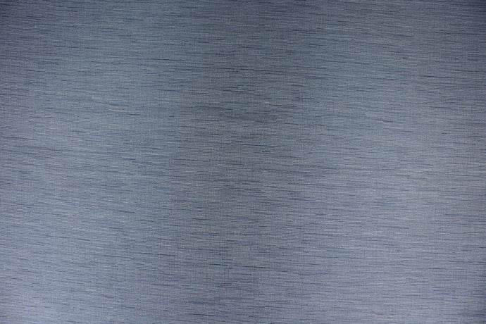 This multi-purpose mock linen in indigo with light blue tones has a classic raw silk look and is suitable for draperies, curtains, cornice boards and headboards.  We