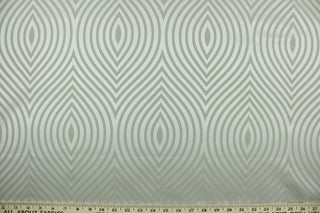 Raleigh features a geometric design in tone on tone silver featuring a slight sheen.  It offers beautiful design, style and color to any space in your home.  It has a soft workable feel and is perfect for window treatments (draperies, valances, curtains, and swags), light duty upholstery, bed skirts, duvet covers, pillow shams and accent pillows.  