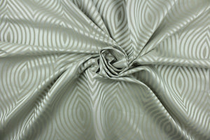 Raleigh features a geometric design in tone on tone silver featuring a slight sheen.  It offers beautiful design, style and color to any space in your home.  It has a soft workable feel and is perfect for window treatments (draperies, valances, curtains, and swags), light duty upholstery, bed skirts, duvet covers, pillow shams and accent pillows.  