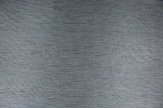 This multi-purpose mock linen in charcoal with blue tones has a classic raw silk look is suitable for draperies, curtains, cornice boards and headboards.  We offer this fabric in other colors.