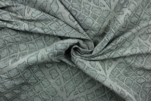 Procioa is a multu use jacquard fabric that features a geometrical design in platinum.  A slight sheen enhances the design.  It is great for home décor such as upholstery, window treatments, pillows, duvet covers, tote bags and more.  It has a soft workable feel yet is durable and stable.