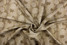 Load image into Gallery viewer, This fabric features a varying shapes of circles in the colors of linen and deep beige.  It has a soft drapable hand and would be ideal for swags, window scarves and drapery panels.
