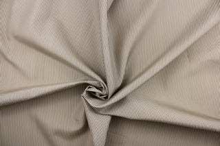 This textured stiped fabric in graphite and beige is great for home decor such as multi-purpose upholstery, window treatments, pillows, duvet covers, tote bags and more.  It has a soft workable feel yet is stable and durable.