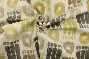 This fabric features a design in grays, brown, taupe, green, and golden yellow set against a pale beige background.