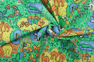 At the Zoo is a vibrant, cheerful print that is perfect for outdoor settings or indoors in a sunny room.  This multi use fabric features a water and stain resistant finish.  Uses include decorative pillows, cushions, chair pads, tote bags and upholstery.  Colors included are orange, yellow, blue, green, white and black.