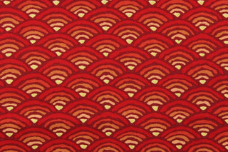 This fabric features an abstract geometric arch in red, orange, pink and yellow . 