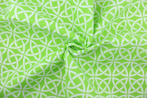 Nordic is a large geometric print with interlocking shapes in lime green and white.  It is perfect for outdoor settings or indoors in a sunny room.  It is stain and water resistant and can withstand up to 700 hours of direct sun exposure.  Uses include decorative pillows, cushions, chair pads, tote bags and upholstery. 