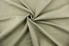 Load image into Gallery viewer,  A mock linen in light green with hints of pale gold. 
