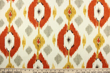 Load image into Gallery viewer, This multi-purpose fabric features a large ikat design in gray, orange, yellow and neutral. It will stand up to abrasion and tension to bring long lasting beauty to your home.  Uses include drapery, headboards, bedding, accent pillows, cushions, slip covers and upholstery.
