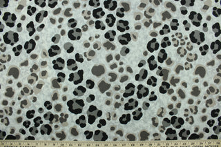 This fabric features a leopard print design in black, gray, and brown on a light gray background.  The multi use fabric is perfect for window treatments, decorative pillows, custom cushions, bedding, light duty upholstery applications and almost any craft project.  It has a soft workable feel yet is stable and durable.  