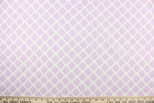 Load image into Gallery viewer, This printed flannel features a lattice design in white and lavendar.  Uses include apparel, bedding, pillows, home decor and crafting.  This fabric has a soft workable feel. 
