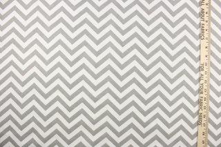 This printed flannel features a chevron pattern in grey and white.  Uses include apparel, bedding, pillows, home decor and crafting.  This fabric has a soft workable feel. 