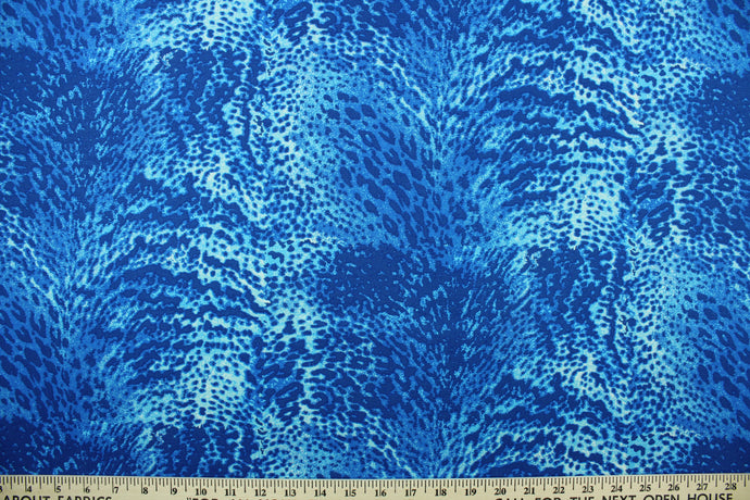 Aquatic features a reptile skin print design in varying shades of blue.  The multi use fabric is perfect for window treatments, decorative pillows, custom cushions, bedding, light duty upholstery applications and almost any craft project.  It has a soft workable feel yet is stable and durable.  